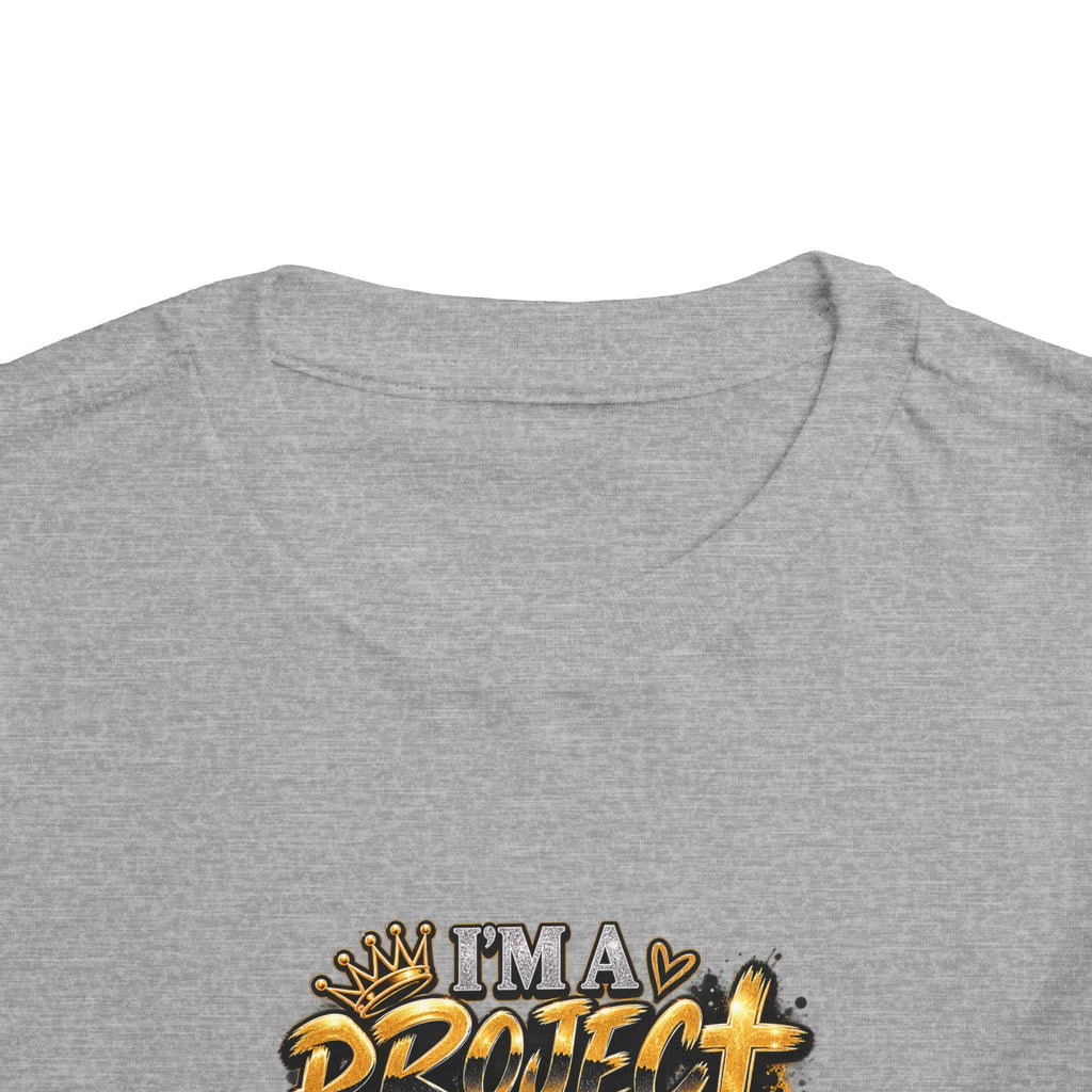 Toddler Tee — "I'm a Project Baby" Afro Girl Construction Graphic