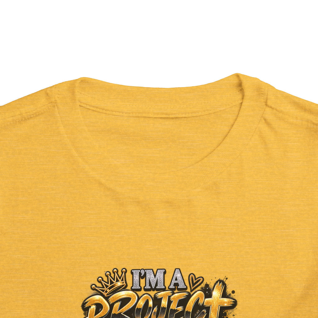 Toddler Tee — "I'm a Project Baby" Afro Girl Construction Graphic