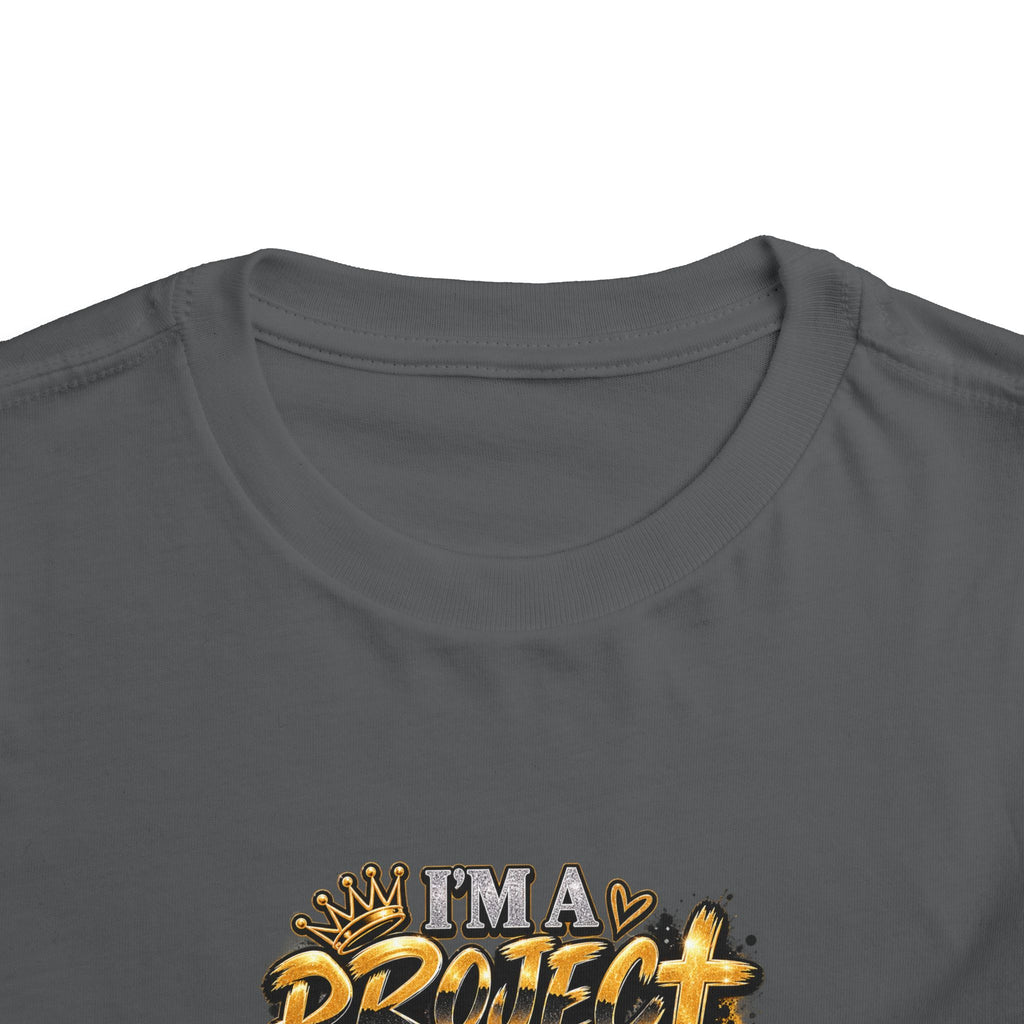 Toddler Tee — "I'm a Project Baby" Afro Girl Construction Graphic